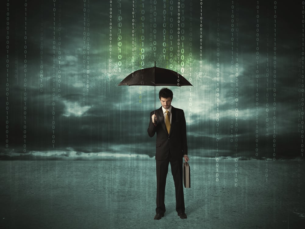 Business man standing with umbrella data protection concept on background-2