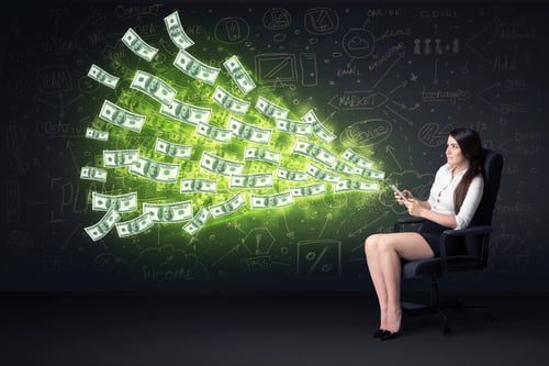 Businesswoman sitting in chair holding tablet with dollar bills coming out concept on background-2