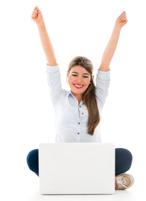 Happy woman enjoying her online success - isolated over white background