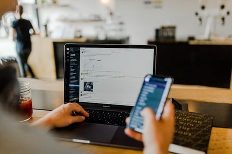 WiFi Solutions Laptop and Phone in Office