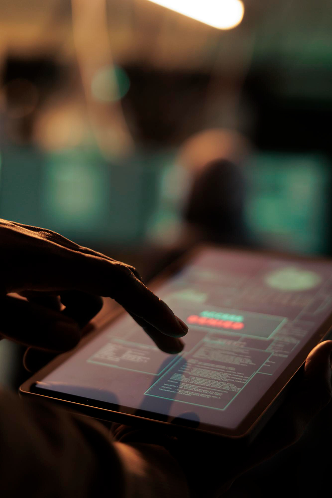 african-american-hacker-holding-tablet-hack-online-system-causing-malware-network-planning-cyberattack-looking-security-server-access-database-steal-passwords