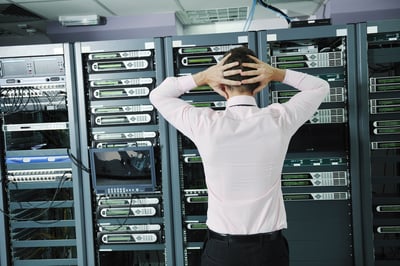 it business man in network server room have problems and looking for  disaster situation  solution-2-2