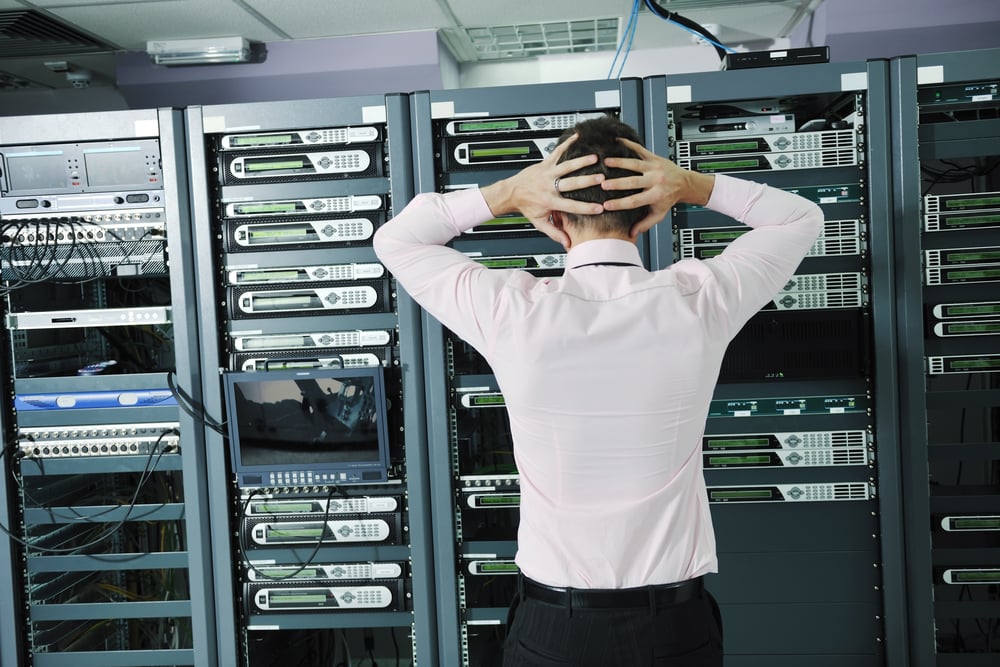 it business man in network server room have problems and looking for  disaster situation  solution-Oct-19-2023-04-54-41-4915-PM